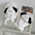 Detail of plush cream puppy slippers featuring fuzzy texture and decorative woven labels - 3D Dog White
