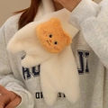 Detail of soft white plush winter scarf with a cute orange 3D cartoon bear decoration - Butter Bear Pattern Scarf