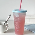 Macro shot of frosted plastic straw cup featuring decorative strawberry cake recipe text - Sea Salt Cake / Large