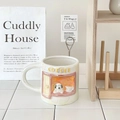Detail of 3D embossed puppy window design on cream ceramic mug with coffee lettering - 320ml / Coffee Puppy
