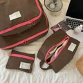 Detail of travel organizer set in brown and pink with waterproof checkered fabric - Small / Mocha Brown