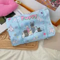 Light blue puppy themed makeup bag with cute star illustrations and elastic closure - Puppy
