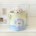 Close-up of canvas laundry hamper with cute puppy print and sturdy cotton rope handles - Westie