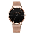 Macro detail of Geneva quartz watch with rose gold mesh band and minimalist black dial - Rose Gold Mesh Strap Rose Gold Case Rose Gold Dial