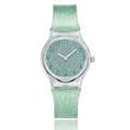 Detail of light green glitter dial with clear Arabic numerals and silicone strap - Green