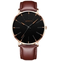 Fashionable Geneva quartz watch with a brown leather strap and sleek black dial face - Rose Gold Case Rose Gold Hands Brown Leather Strap