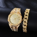 Luxury gold men's watch with crystals and matching chain bracelet set on black stand - Gold + Bracelet