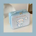 Detail view of large blue checkered makeup case with cute dog and 24x11x18cm dimensions - Bubble Puppy