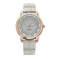 Detailed view of rose gold quartz watch featuring a gray alligator texture leather strap - Gray