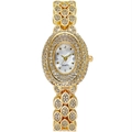 Montre à quartz luxe pour femme dorée avec bracelet à strass en forme de feuille - Doré