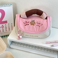 Detail of cute pink fabric pencil case with embroidered stars and a durable handle - Rose Canelé