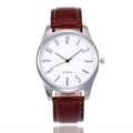 Detail of silver quartz watch with white dial and brown bamboo pattern leather strap - Brown Strap White Dial
