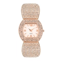 Detail of rose gold tonneau watch featuring high-density rhinestones and quartz dial - Rose Gold