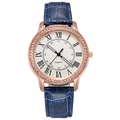 Detail of rose gold watch bezel with rhinestones and navy blue crocodile leather strap - Blue