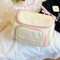 Cremeweiße Schleifen-Kosmetiktasche mit rosafarbenem Griff und Stickerei-Detail - Groß / Weiß