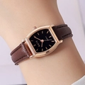 Close-up of rose gold tonneau quartz watch with black dial and brown leather strap - Rose Strap Rose Gold Case Black Dial