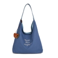 Borsa tote in tela blu con ricamo giallo e ciondolo in pelle marrone - Blu