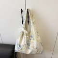 Floral aesthetic tote bag in cream with blue accents and a lace bow detail - Multicolor With Pendant