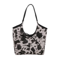 Chic cow print tote bag with black bow detail and slim shoulder straps for summer - Black