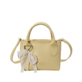 Pale yellow bucket bag with litchi texture leather and lace pearl bow charm - With Pendant / Yellow