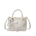 White pebbled leather handbag with top handle and elegant lace pearl bow charm decoration - With Pendant / White