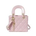 Pink patent leather quilted handbag with gold hardware and a circular top handle - Pink With Pendant
