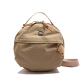 Minimalist round khaki nylon crossbody bag with circular metal hardware and adjustable strap - Khaki