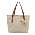Large beige tote bag with geometric stitching, brown straps and a cute dog pendant - White