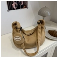 Detail of corduroy tote bag with small coin purse and adjustable shoulder strap buckle - Khaki