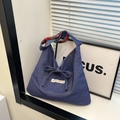 Sac fourre-tout en denim ethnique avec cordon, nœud et doublure imprimée vintage - Bleu