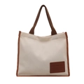 Bolso tote minimalista con textura de gofre y asas marrones en contraste sobre fondo blanco - Blanco