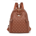 Fashionable dark brown quilted leather backpack for women with gold rivet accents - Brown