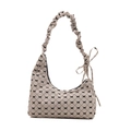 Hobo canvas schoudertas met zwarte strikprint en geplooide riem op witte achtergrond - Khaki