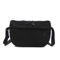 Minimalist black nylon crossbody bag with dual-zipper compartments and adjustable wide strap - Black