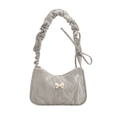 Silver-gray ruched hobo bag featuring a metal butterfly ornament and Y2K aesthetic - Silver