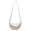 Chic silver metallic dumpling crossbody bag with elegant pleated design and knotted strap - Silver