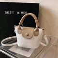 Elegante bolso tipo cubo bicolor en cuero beige y blanco con asas y correa de hombro - Blanco