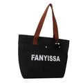 Bolso tote de lona negra con asas tejidas marrones y adorno de peluche suave - Negro Con Colgante