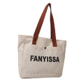 Large beige canvas tote bag with brown straps and FANYISSA pocket detail - White Without Charm