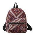 Sac à dos ethnique minimaliste avec motifs géométriques colorés et bretelles noires - Rouge