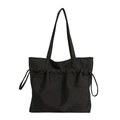 Minimalistische schwarze Canvas-Tasche mit viel Platz und vorderer Kordelzug-Tasche - Schwarz
