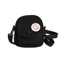 Compact black canvas crossbody bag for women with cute cartoon badge and adjustable strap - Black