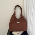 Large capacity dark brown tote bag with pleated texture and stylish fashion label - Brown