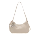 Minimalist cream white bow shoulder bag with silver pendant and dual strap design - White