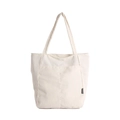 White corduroy tote bag with dual shoulder straps and black fashion label tag - White