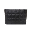Black quilted makeup bag with zipper closure and puffer texture for travel storage - Black
