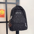 Schwarzer Cord-Rucksack mit kleinen Herz- und Bogenprints, inklusive Brezel-Anhänger - Schwarz (Mit Anhänger)