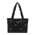 Large black quilted tote bag with silver bow accent and white bow patterns for 2025 fashion - Black