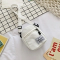 Mini white canvas crossbody bag for women with adjustable strap and branding patch - White