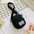 Mini black canvas crossbody bag with Augur label and adjustable shoulder strap - Black